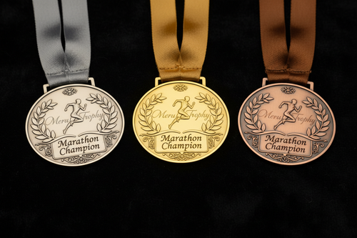 Premium gold silver and bronze medals with custom engraving for marathon winners from Meru Trophy in India.