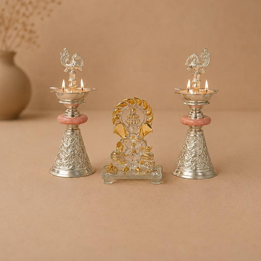 Mangal Ganapatil hamper, handcrafted metal peacock samai lamp and glass Ganesh idol