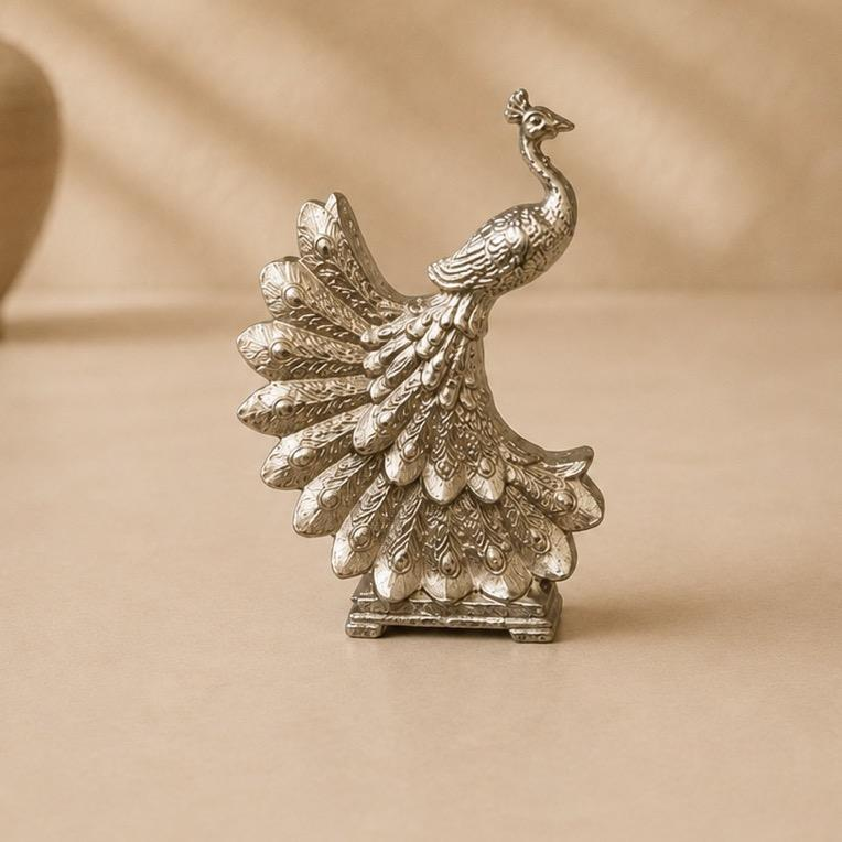 Mayur Prabha Murti, handcrafted silver-finish metal peacock figurine