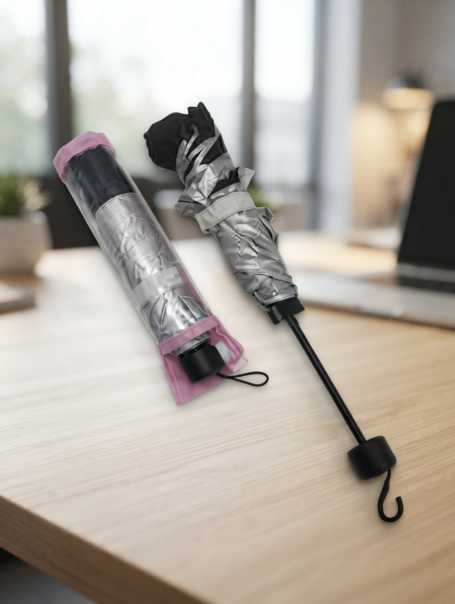 Compact Folding Umbrella - lifestyle desk shot - Meru Trophy corporate gifting