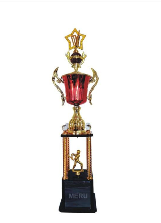 Gold and red metal cricket trophy with a star and cricketer figurine.