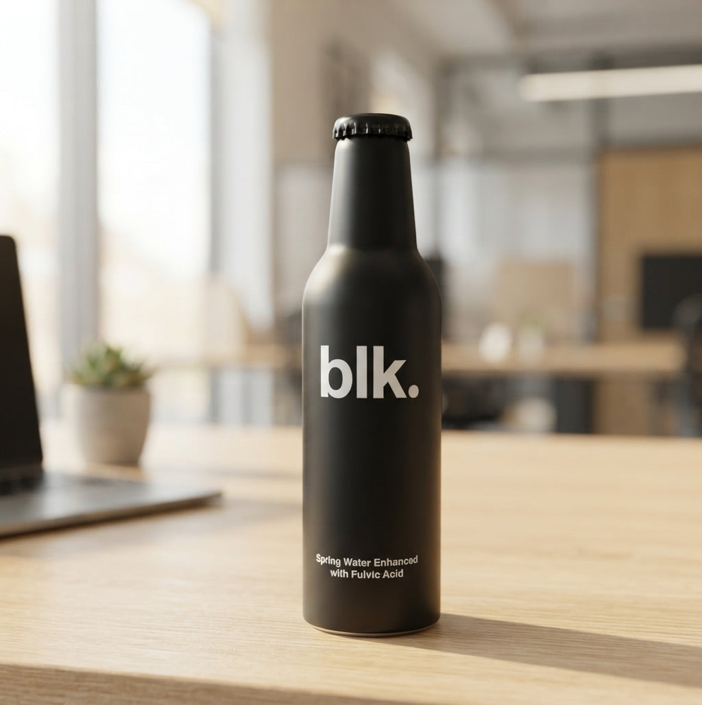 Aluminum Beverage-Style Bottle - lifestyle desk shot - Meru Trophy corporate gifting