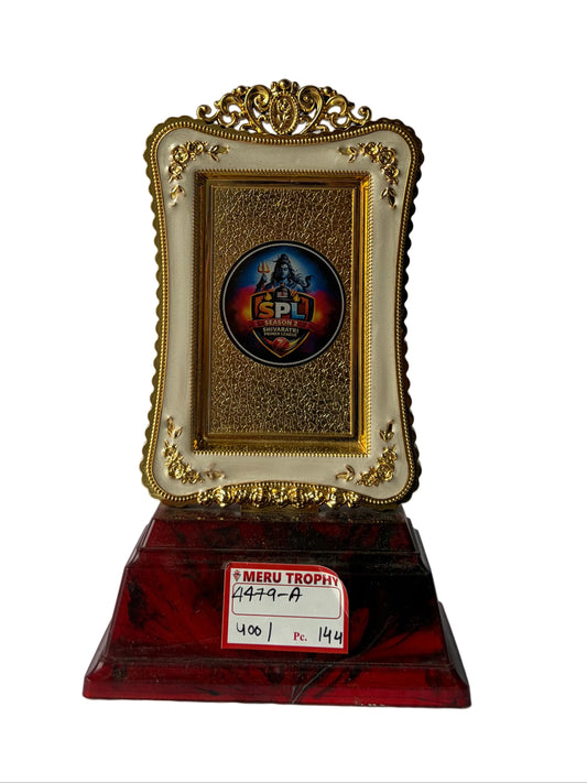 Ornate gold framed 4479 A custom trophies with a red marble base and decorative emblem for special recognition.