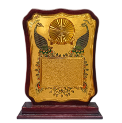 Gold emblem and laurel wreath on a custom engraved wooden trophy.